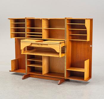 A mahogany veneered convertible cabinet, mid 20th Century.