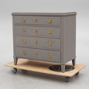 A Gustavian style chest of drawers, early 20th century.