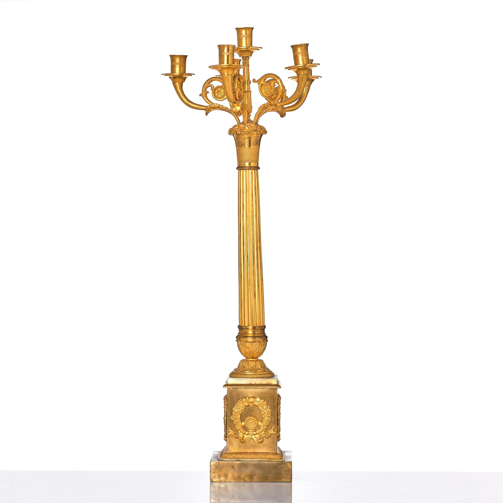 A French late Empire gilded six-light candelabra, mid 19th century.