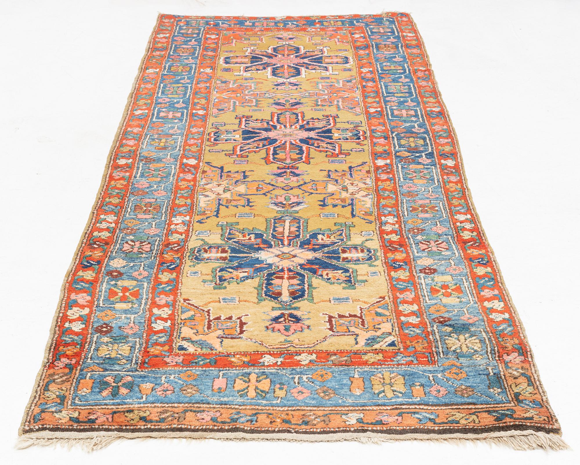 A Heriz Gorovan runner, semi antique, c. 307 x 110 cm.