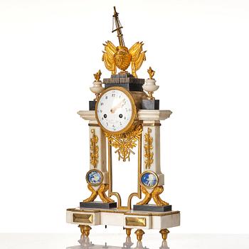 A Louis XVI 18th century mantel clock.