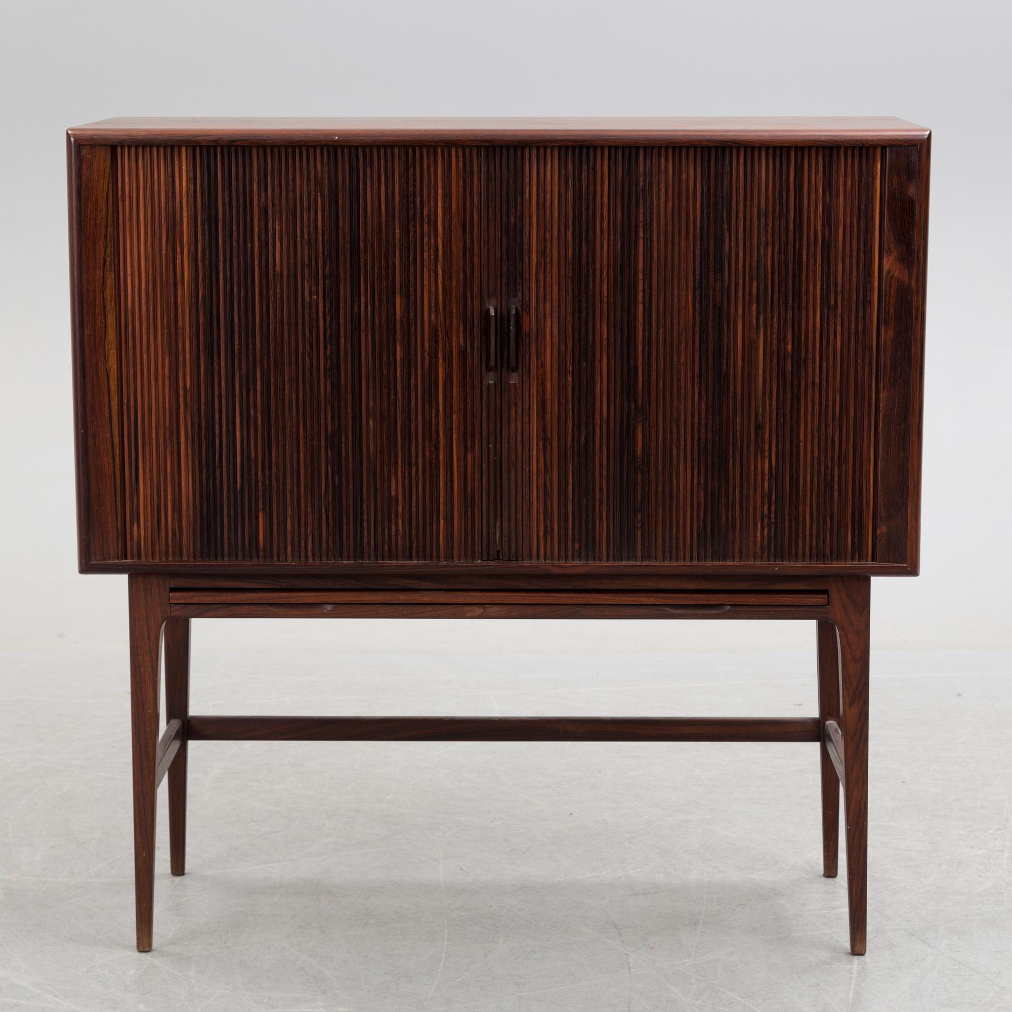KURT ØSTERVIG, a Danish rosewood veneered drinks cabinet, 1960's.