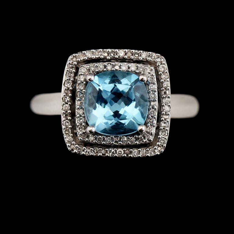 RING, 14K vitguld, diamanter tot ca 0.17 ct och topas. Total vikt ca 5 g.