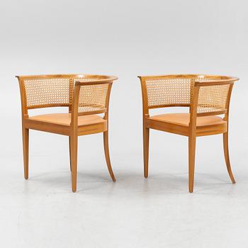 Kaare Klint, a pair of mahogany and natural leather 'Fabourg Chairs', Rud. Rasmussen, Denmark, late 20th Century. .