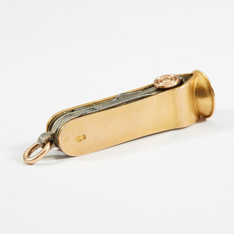 A Russian 20th century gold and metal cigar-cutter, unidentified makers mark, St. Petersburg 1908-1917.