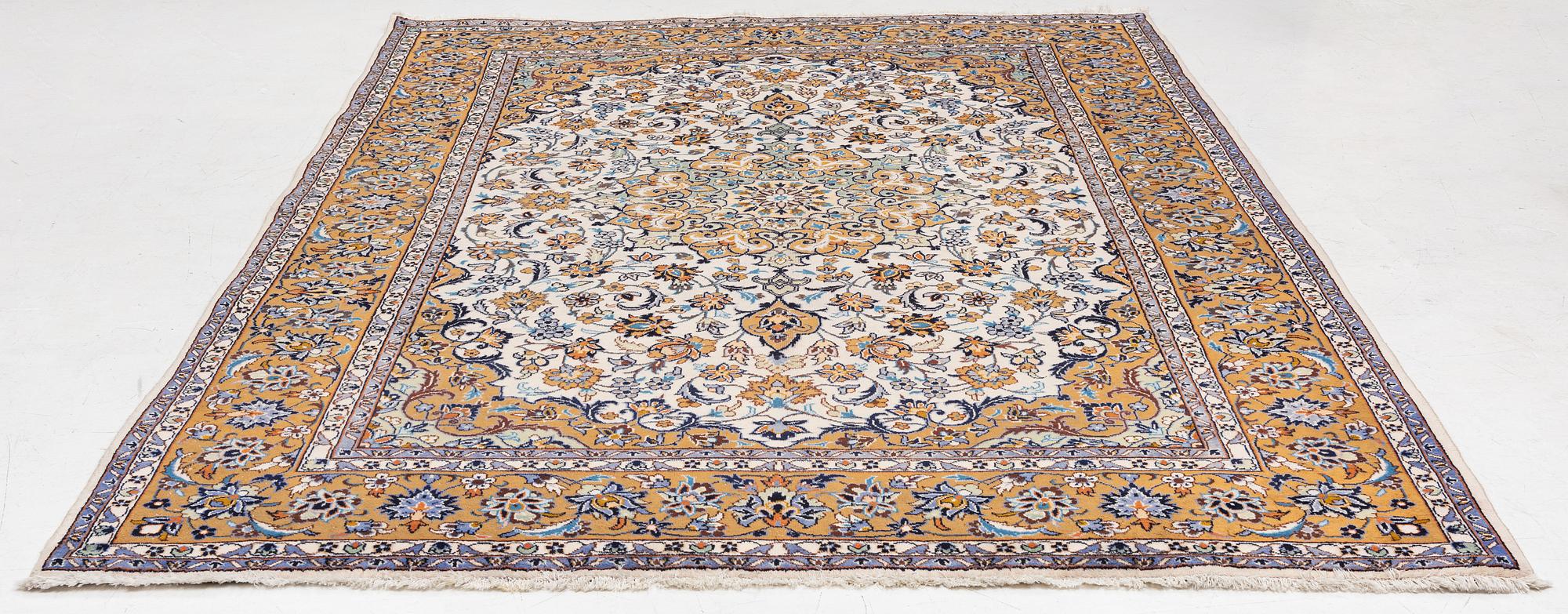 A Najafabad carpet, c. 350 x 237 cm.