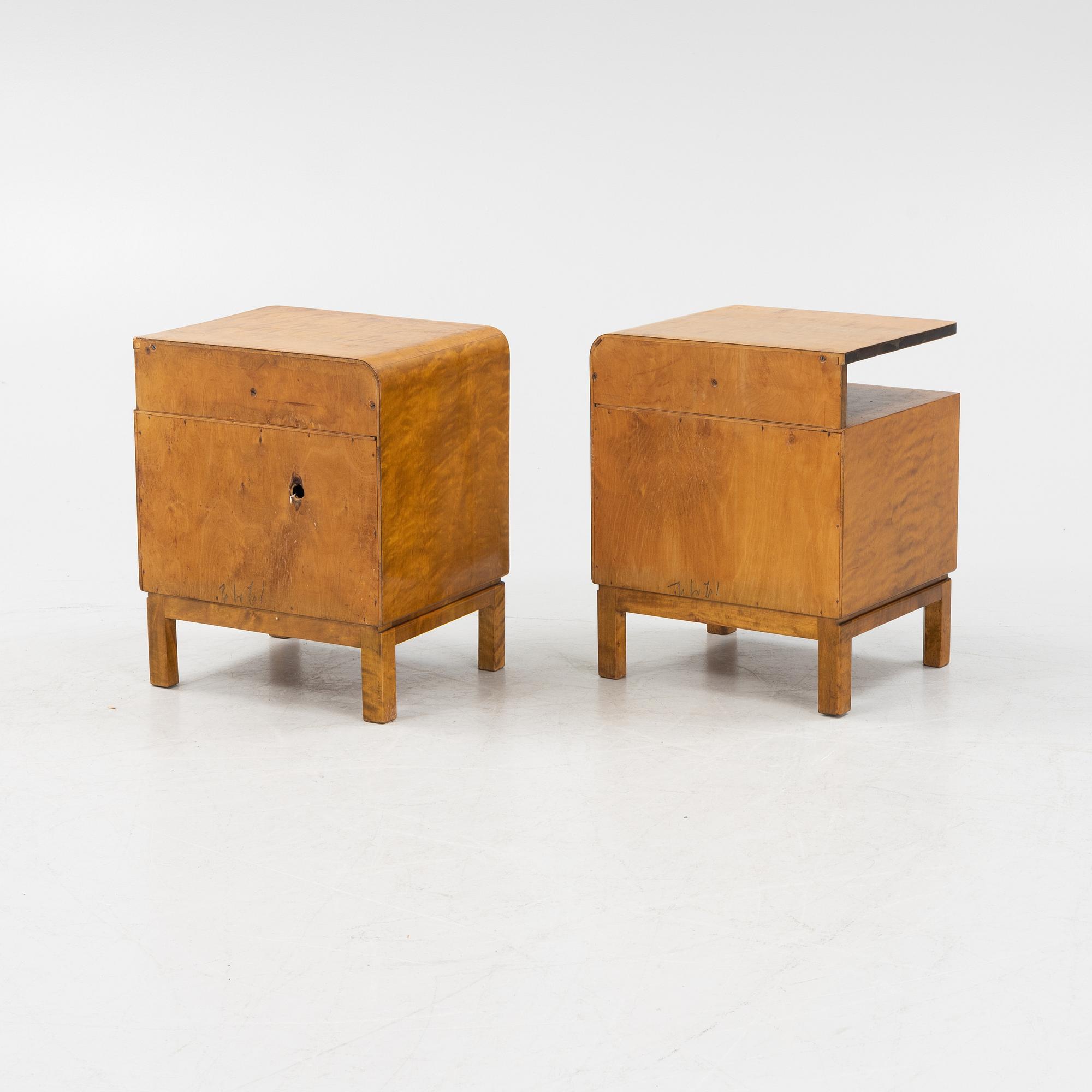 A pair of birch veneered 1930's bedside tables.