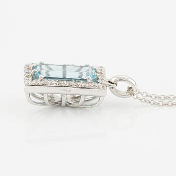 Pendant with chain in 18K gold set with a faceted aquamarine and round brilliant-cut diamonds.