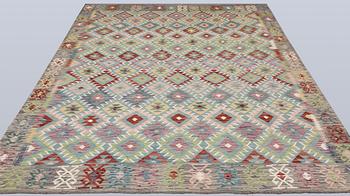 A Killim rug, approx. 295 x 204 cm.