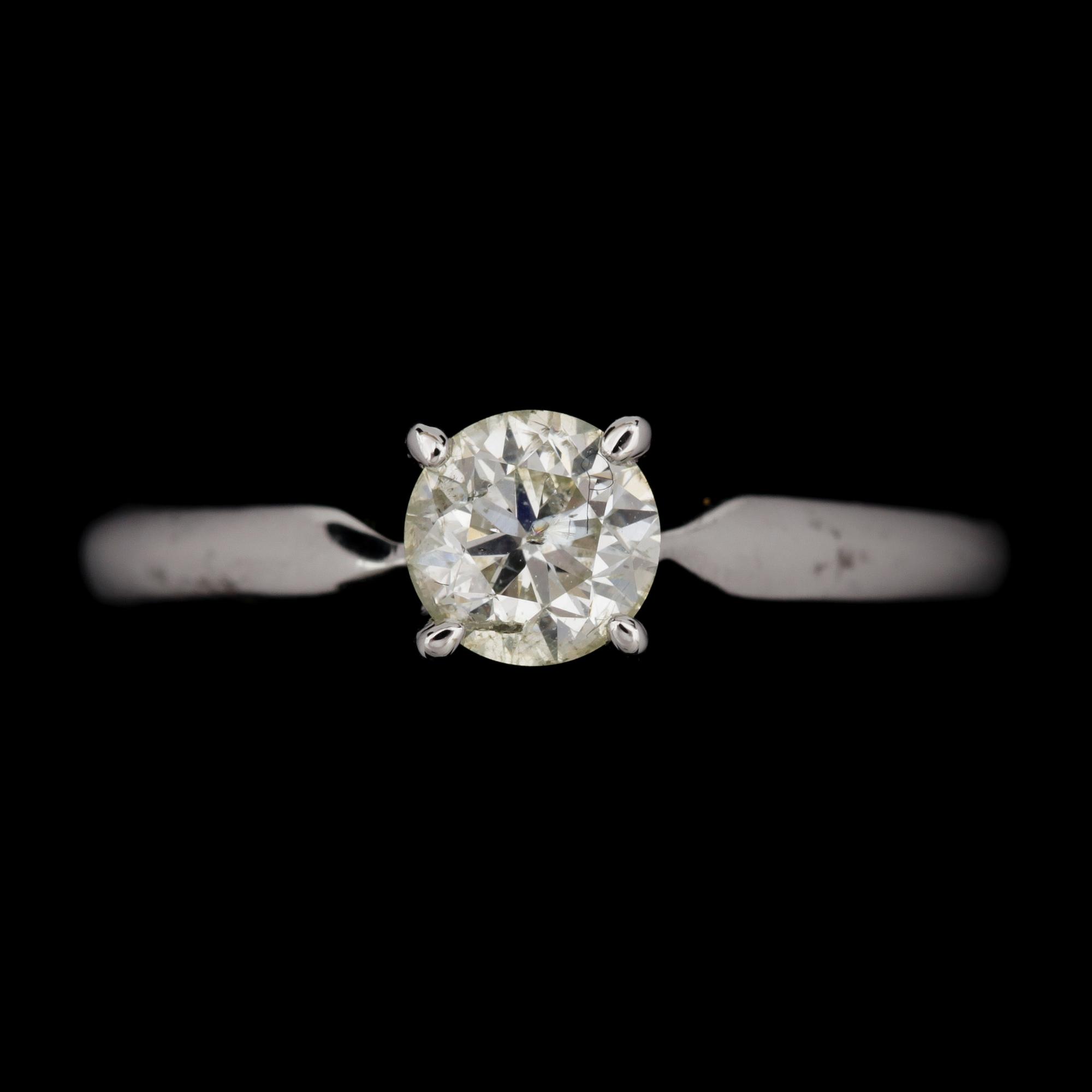 RING, 14k vitguld med briljantslipad diamant tot ca0,50ct. Vikt 1,9g.