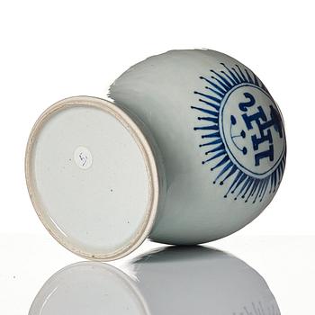 A small blue and white jar with the monogram IHS mirrored, Qing dynasty, 19th Century.