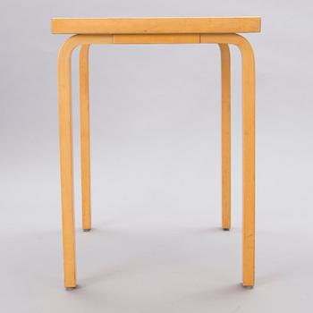 A mid-20th Century table, Artek.
