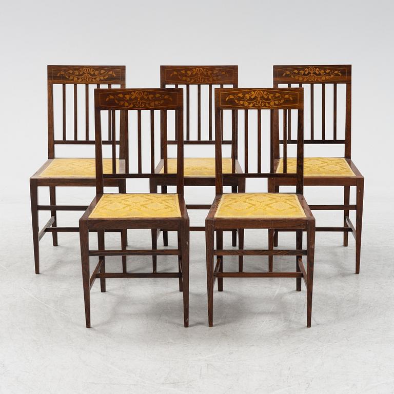 A group of five rosewood veneered chairs and a stool, mid 20th Century.