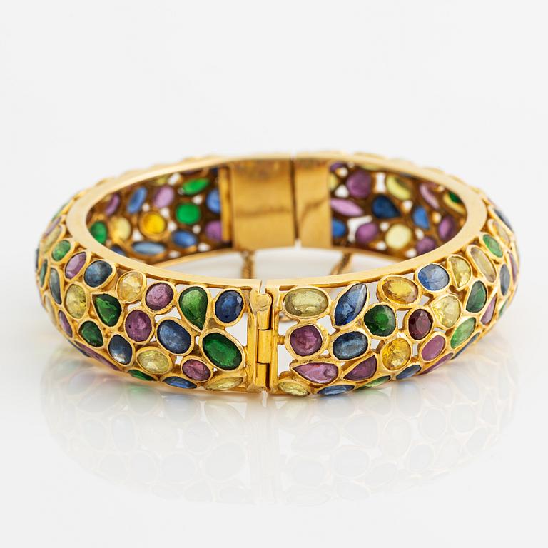 Bracelet, gold with multicolored gemstones.