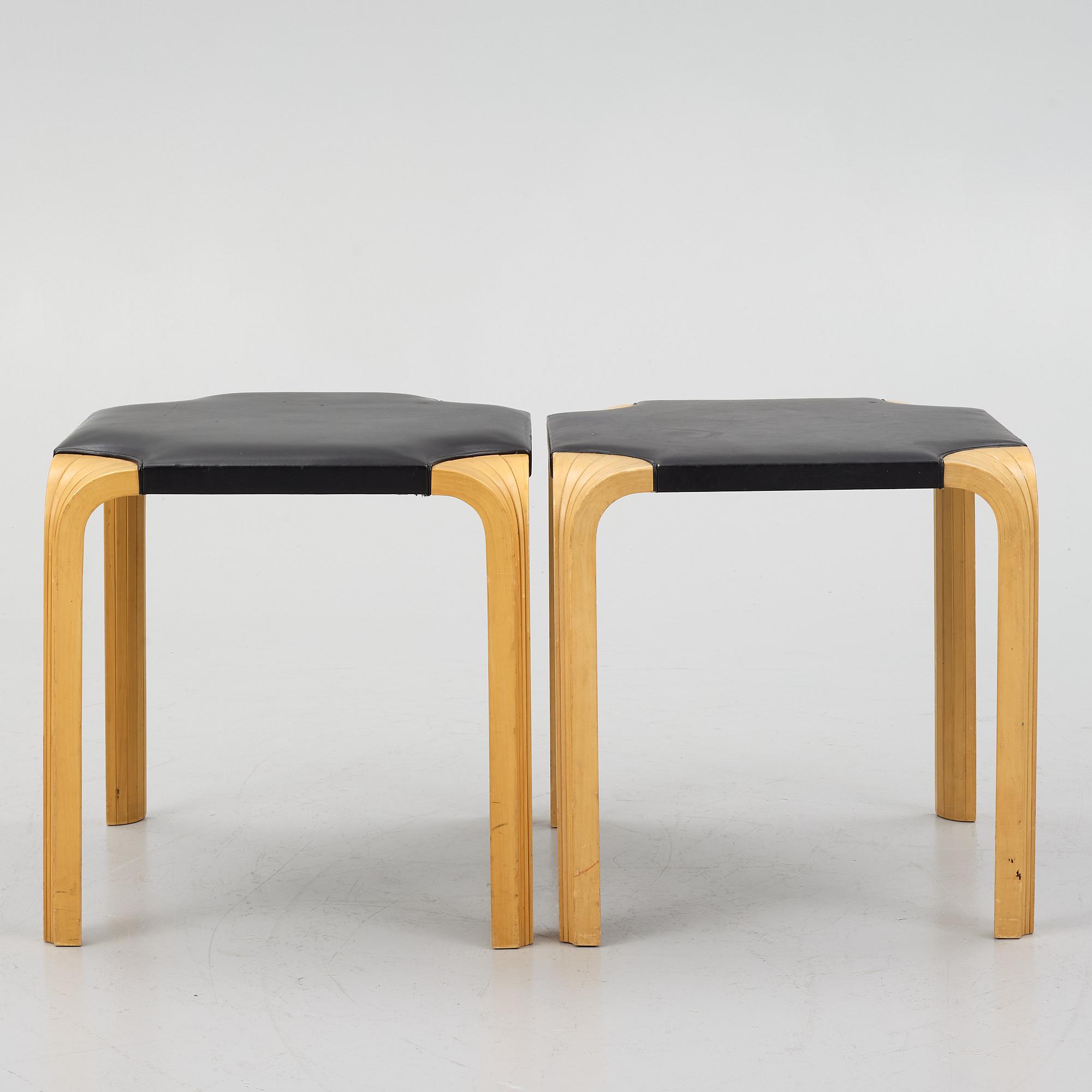 Alvar Aalto, a pair of 'X601' stool for Artek, later half of the 20th century.