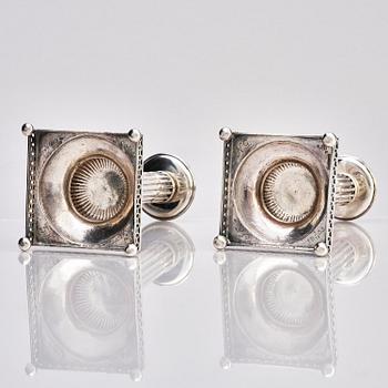 A pair of Swedish 18th century Gustavian silver candlesticks, marks of Arvid Floberg, Stockholm 1799.