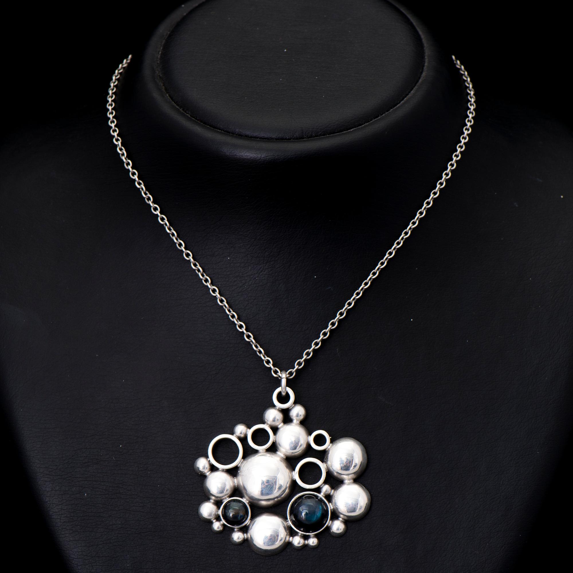 A BÖRJE RAJALIN PENDANT, cabochon cut spectrolites, silver. Kalevala Koru 1982.