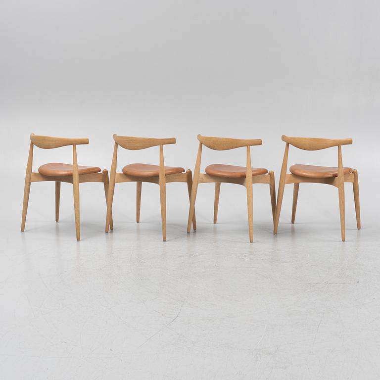 Hans J. Wegner, four oak 'model CH 20' chairs from Carl Hansen & Søn, Denmark.