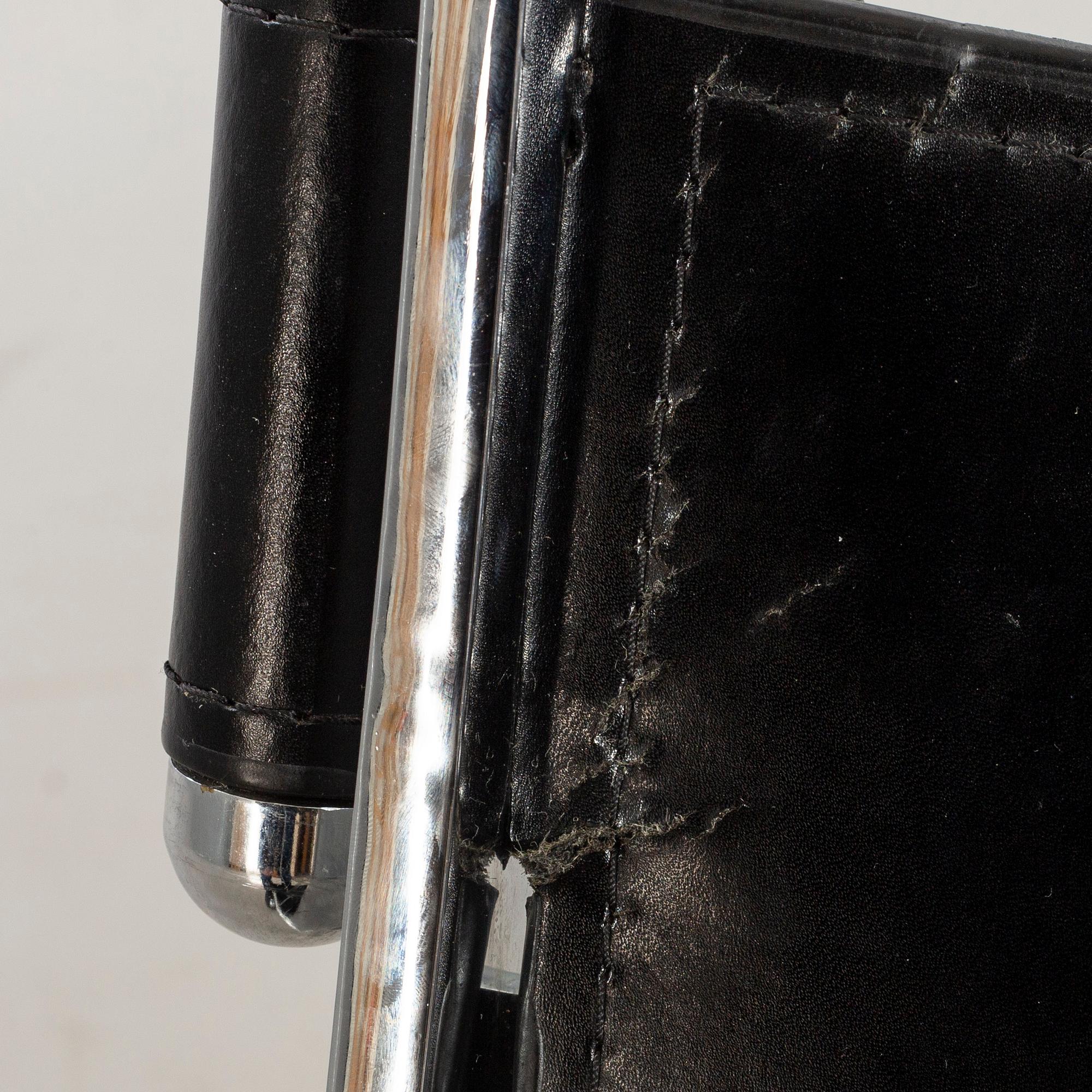 Paul Tuttle For Flexform Lounge Chair In Chrome And Black Leather.