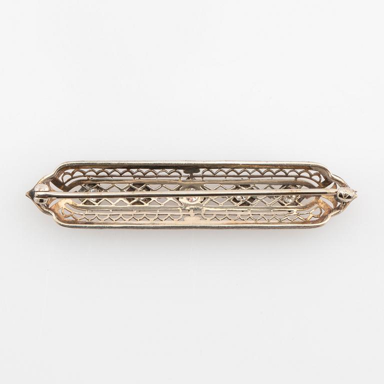 Brooch 14K white gold with round old-cut diamonds.