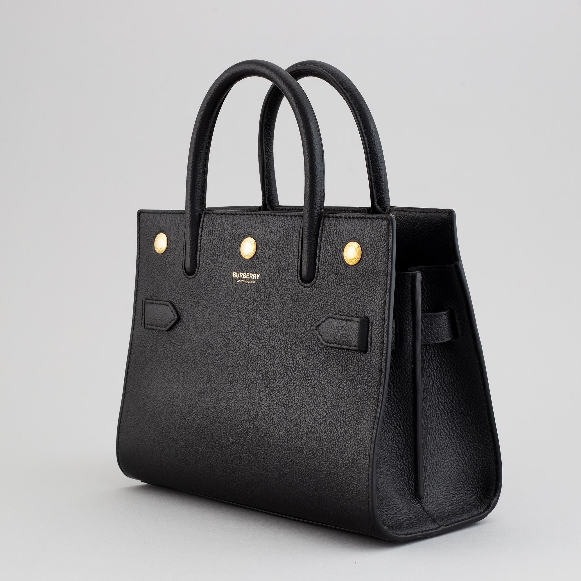 Burberry, a black leather 'Baby Title' handbag, 2019.