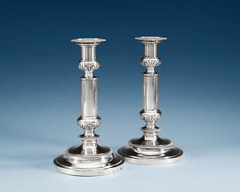 1175. A PAIR OF RUSSIAN SILVER CANDLESTICKS, Makers mark of Nichols & Plinke, S:t Petersburg 1826.