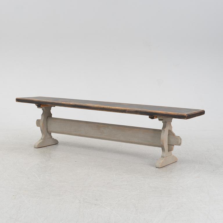 A wooden bench, around 1900.