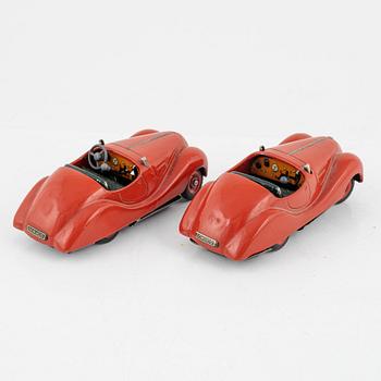 A set of five toy cars, mostly Schuco, Germany.