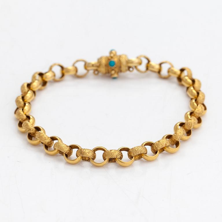 An 18K gold necklace and bracelet, belcher chain with turquoises. Oskar Lindroos, Helsinki 1963.