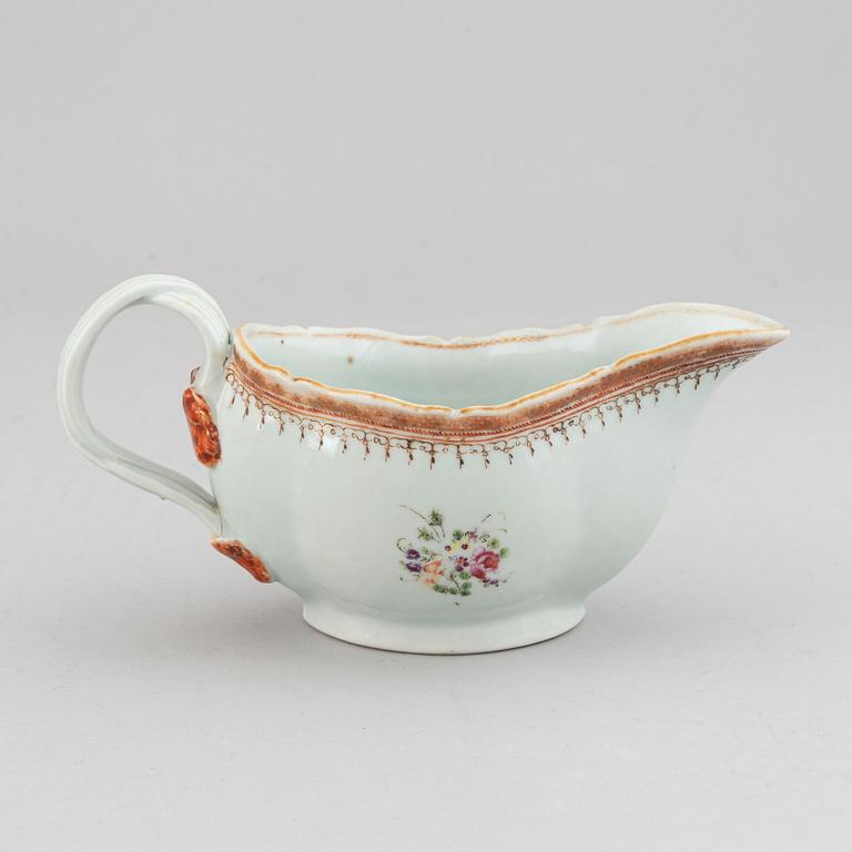 Two famille rose serving dishes and a sauce boat, Qing dynasty, Qianlong (1736-95).