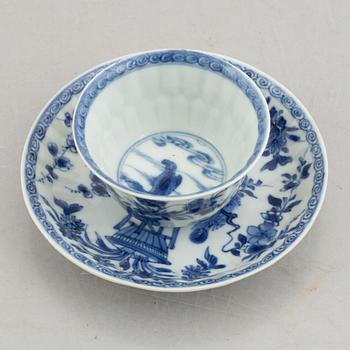 Three (a pair + one) blue and white cups with saucers, China, Kangxi (1662-1722).