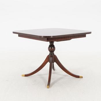 AN English mahogany dining table later part of the 20th century.