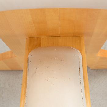 a "plugghästen" chair by Peter Lind.