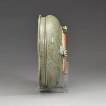 A large tripod celadon censer, presumably late Ming dynasty (1368-1644).