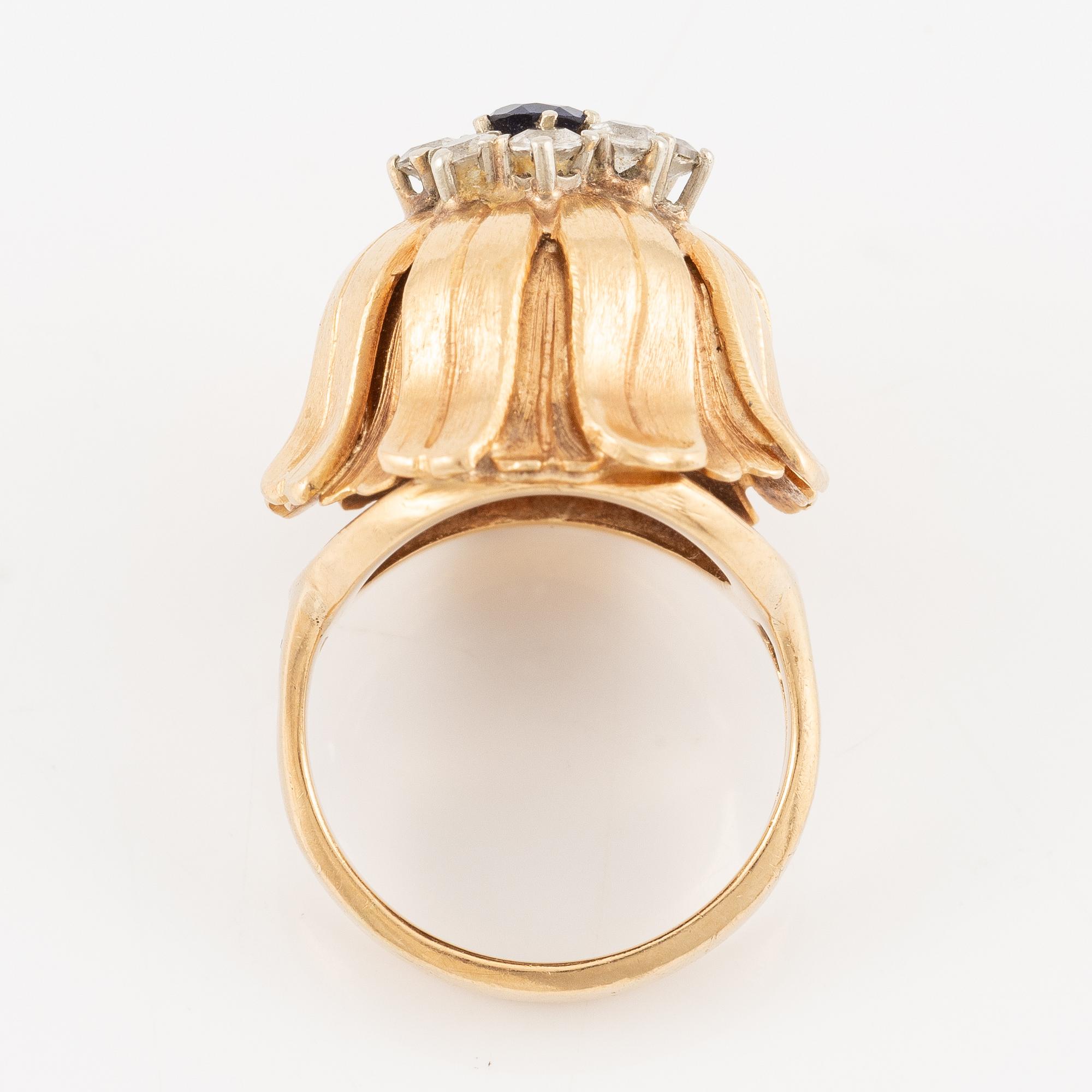Ring, Hans Scherlund, 18K gold with white and blue stones.