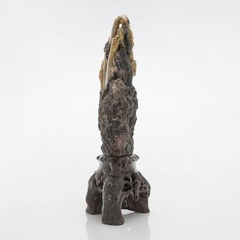 A soapstone sculpture, China, 20th century.