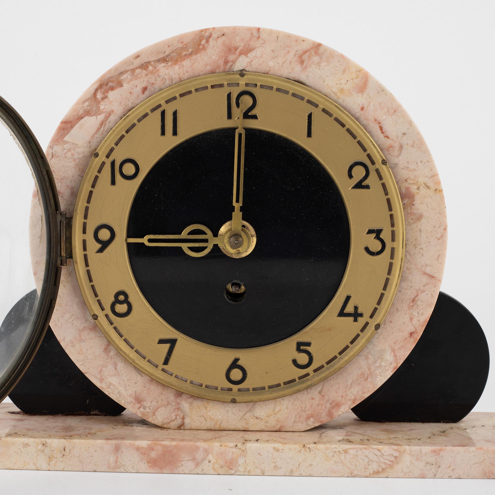 A 3-piece Art Deco mantel clock set, Ucra, France, 1930's.