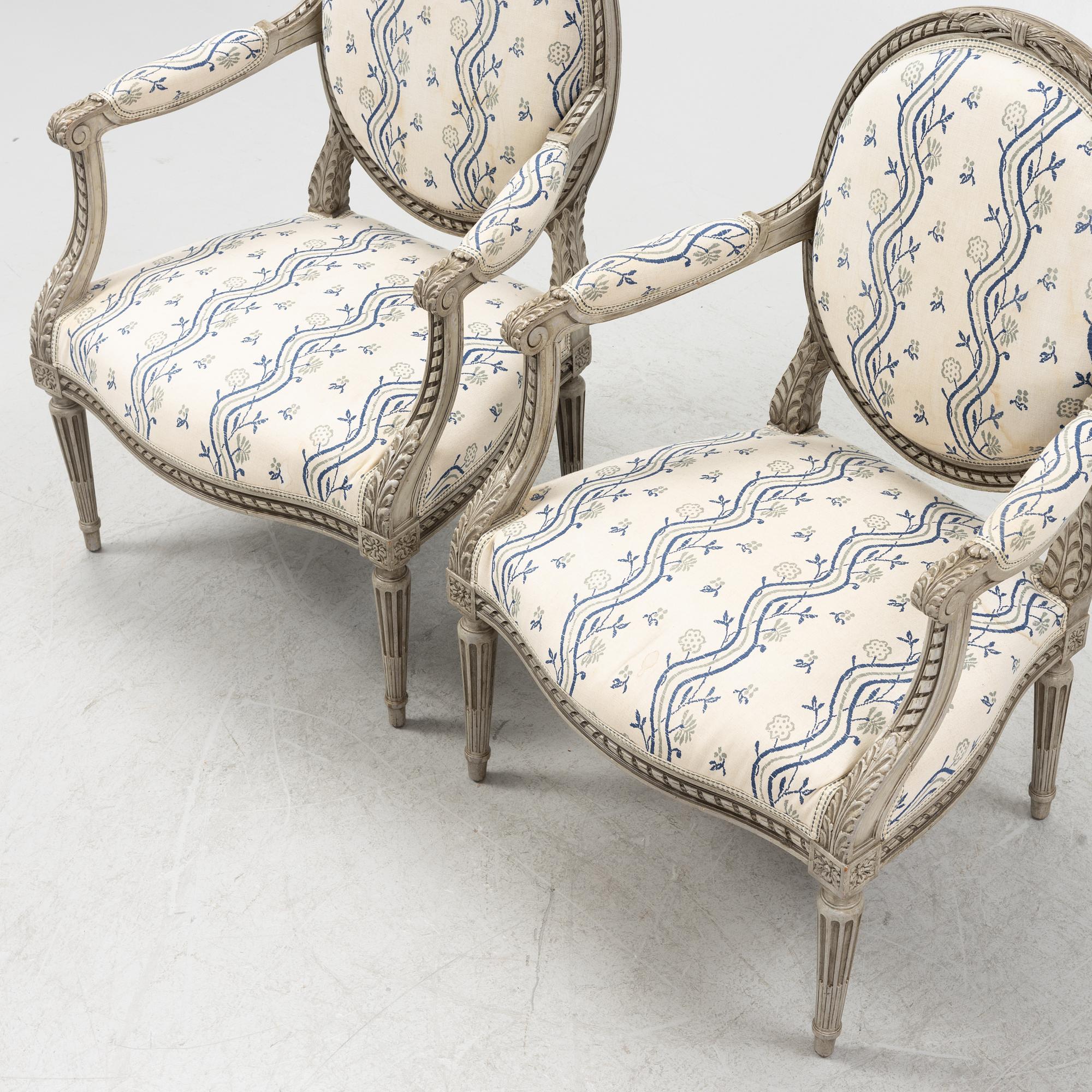 A pair of Gustavian style armchairs, 20th century.
