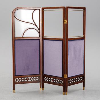 An early 20th century folding screen.