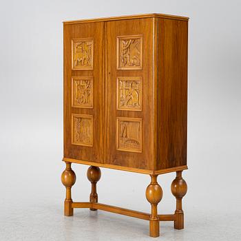 Eugen Höglund, a walnut cabinet, executed in his workshop in Vetlanda, Sweden 1950s.