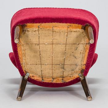 Lisa Johansson-Pape, a 1940s armchair for Oy Stockmann Ab, Keravan puusepäntehdas.