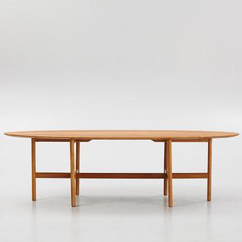 Kerstin Hörlin-Holmquist, an oak and teak coffee table, from the Triva-series, Nordiska Kompaniet, Stockholm, 1960s.