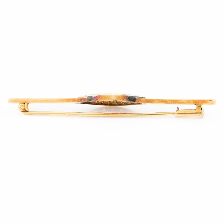 Brooch, 18K gold set with rose-cut diamonds and rubies.