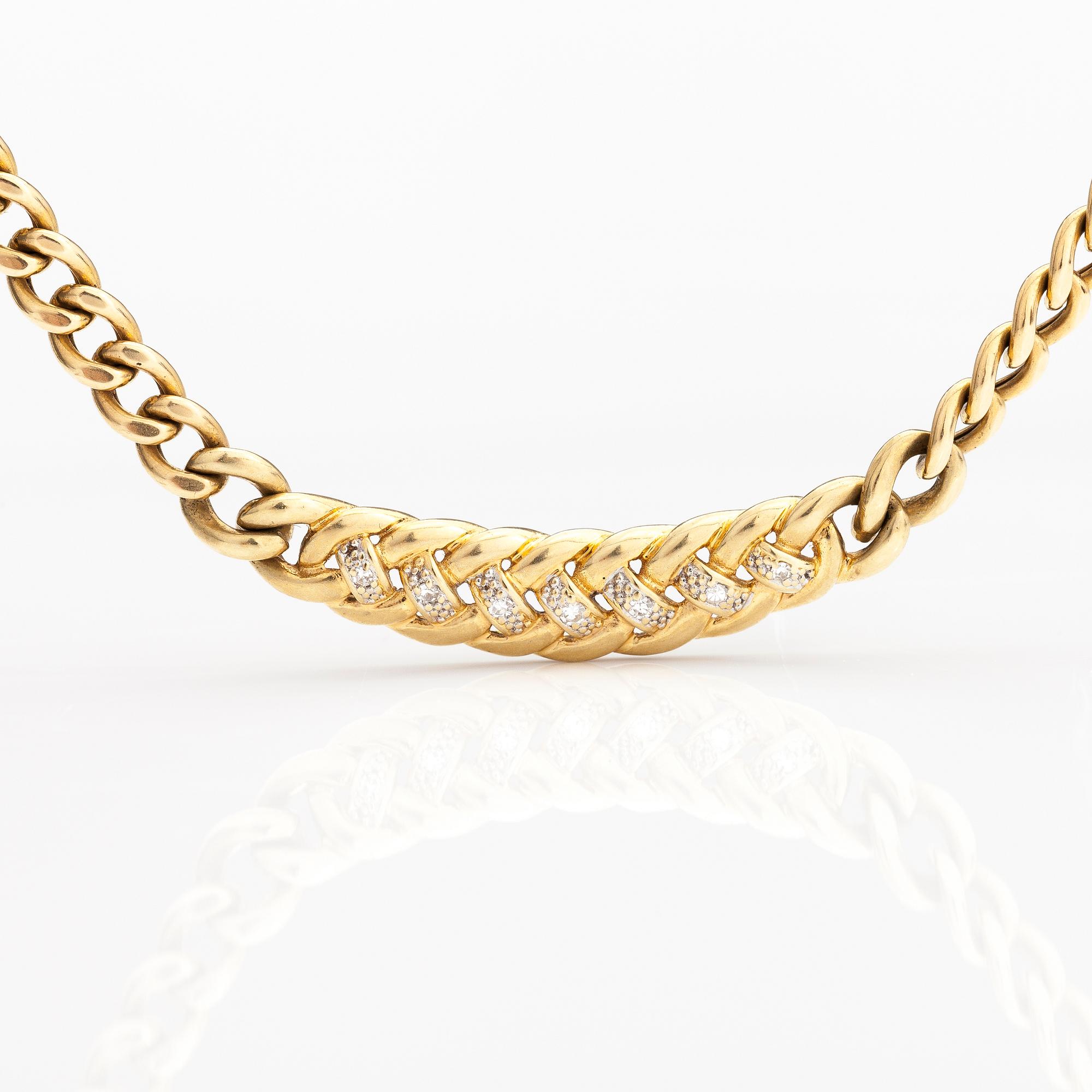 A 14K gold necklace with diamonds ca 0.035 ct in total.
