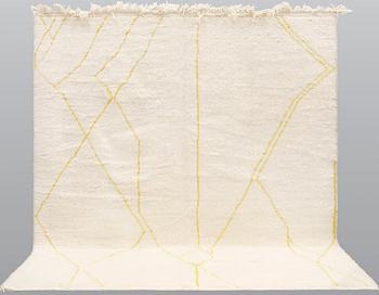 A Moroccan carpet, c. 294 x 250 cm.