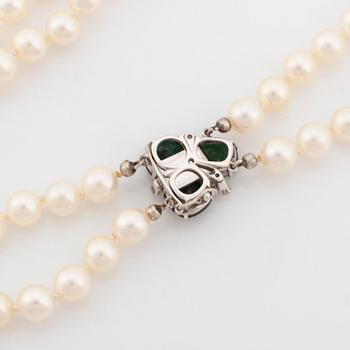 Cultured pearl necklace, clasp Torndals 18K white gold with green tourmalines and brilliant cut diamonds.