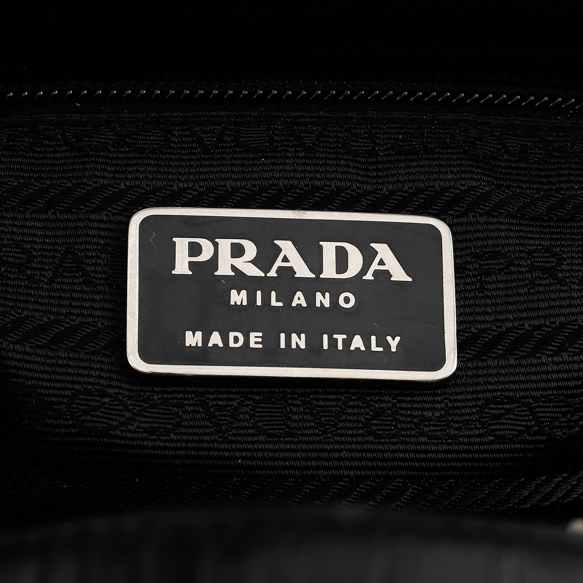 Prada, a patent leather bag.