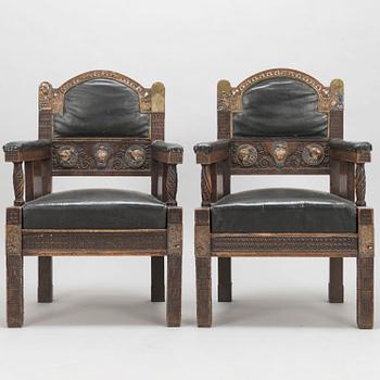 A pair of early 20th century armchairs.