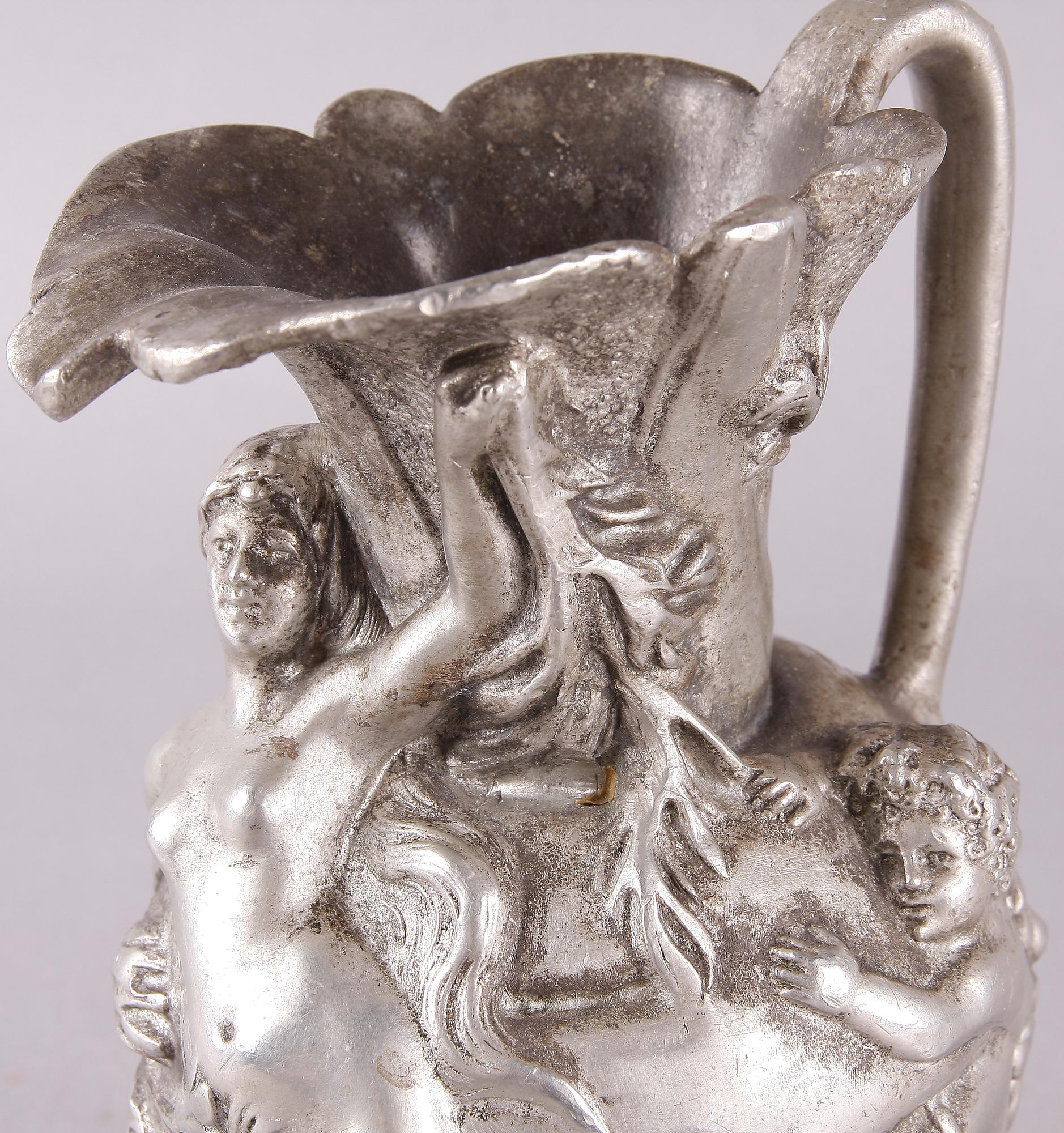 KANNA, tenn. Jugendstil. Märkt J. Garnier.