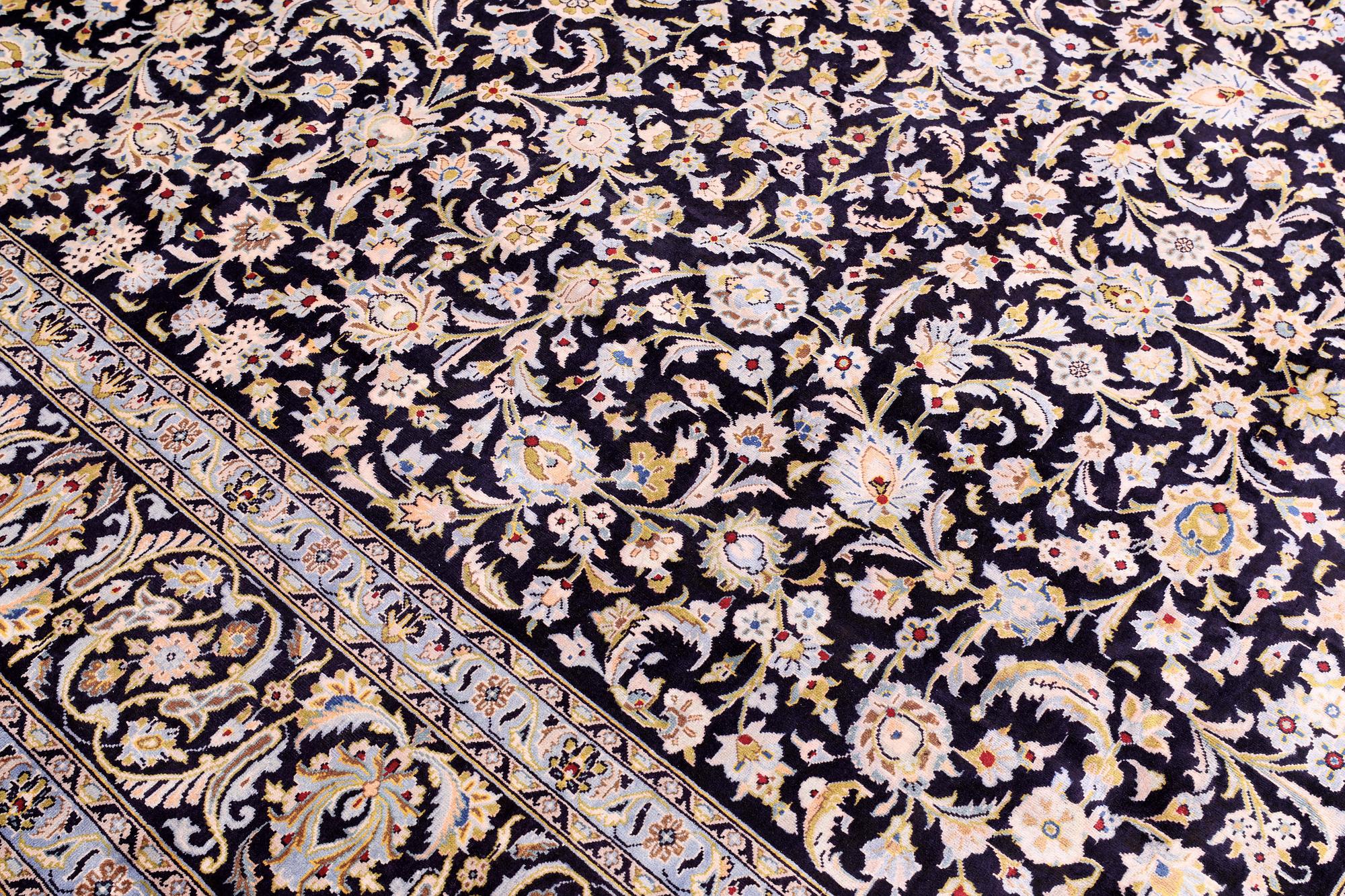 A carpet, Kashan, signed, ca 410 x 292 cm.